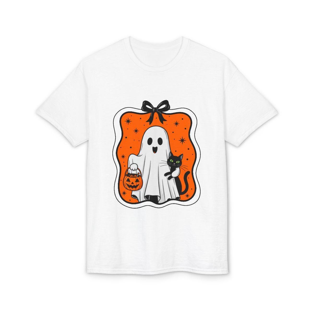 White t-shirt with Halloween-themed graphic featuring a ghost, black cat, and pumpkin on an orange background.
