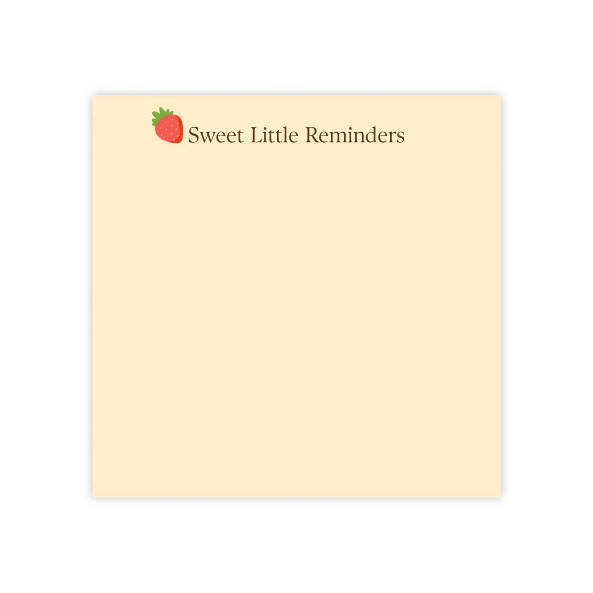 Notepad with 'Sweet Little Reminders' text and strawberry icon on beige background