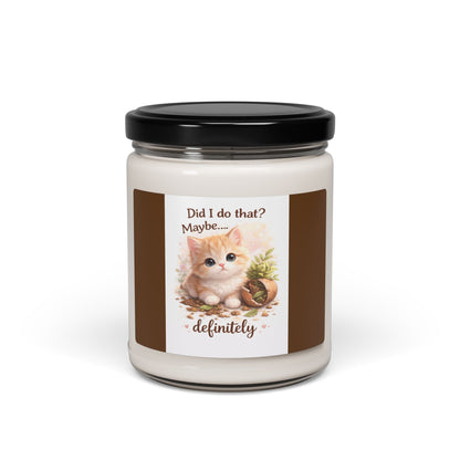 Candle jar with a cat-themed label on a white background