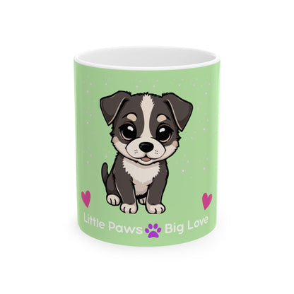 Green mug with a cartoon dog design and text 'Little Paws Big Love' on a white background
