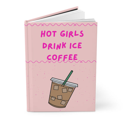 Notebook with 'Hot Girls Drink Ice Coffee' text and a coffee illustration on a pink background
