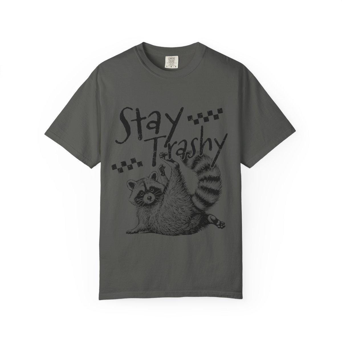 Gray t-shirt with a raccoon graphic and 'Stay Trashy' text on a white background