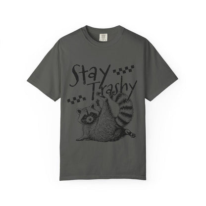 Gray t-shirt with a raccoon graphic and 'Stay Trashy' text on a white background