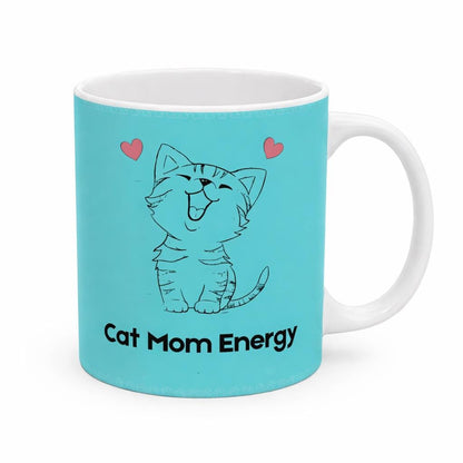 Turquoise mug with a cat illustration and 'Cat Mom Energy' text on a white background