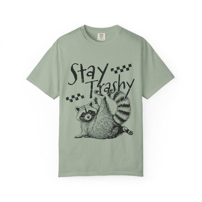 Mint green t-shirt with a raccoon graphic and 'Stay Trashy' text on a white background