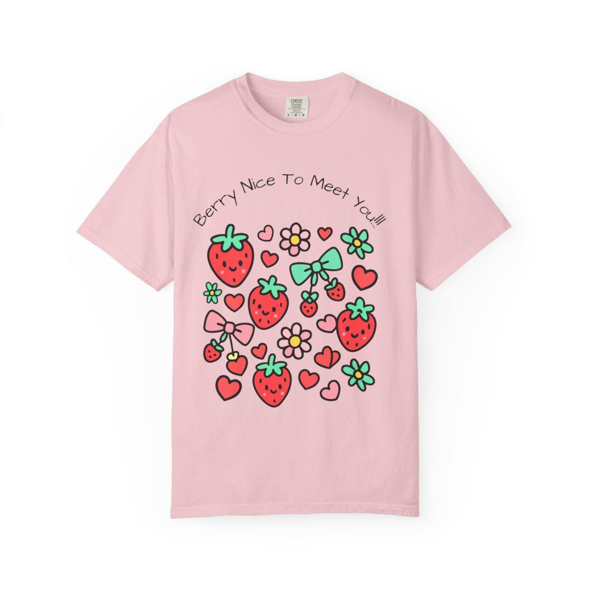Pink t-shirt with strawberry and heart designs on a white background