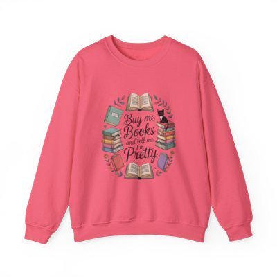 Pink sweatshirt with book-themed design on a white background