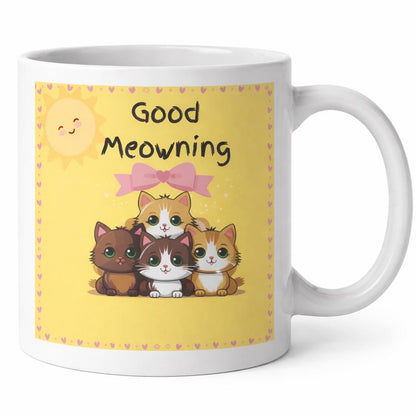 Mug with cartoon cats and 'Good Meowing' text on a yellow background